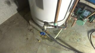 Expert Tips: Fixing and Replacing a Leaking Water Pipe on a Hot Water Storage Tank
