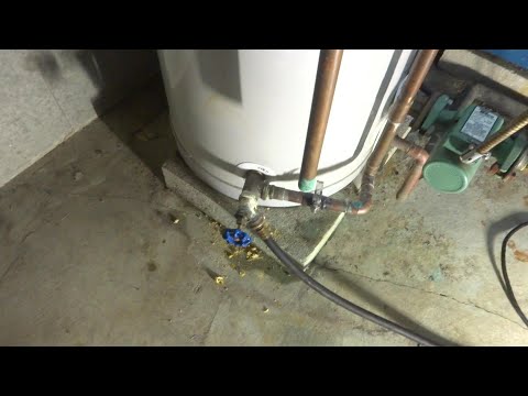 Expert Tips: Fixing and Replacing a Leaking Water Pipe on a Hot Water Storage Tank
