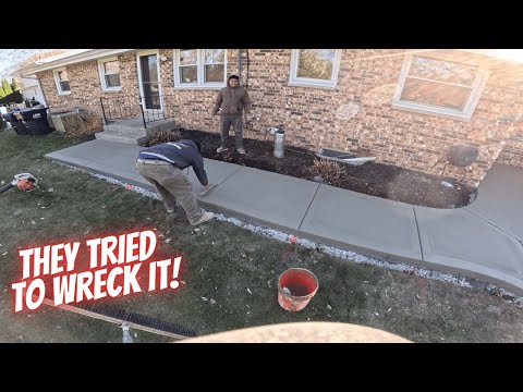 Squirrel runs across our new concrete!